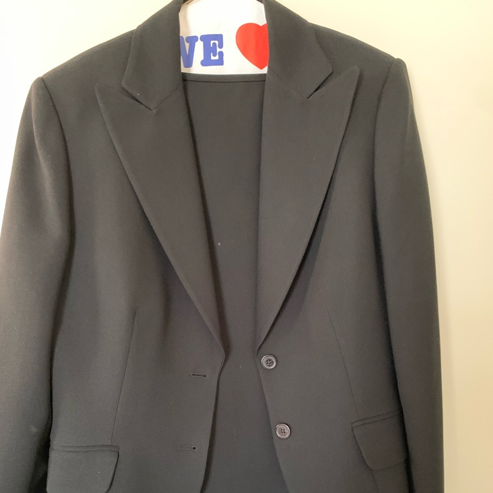 Elegant Black suit with pleated skirt